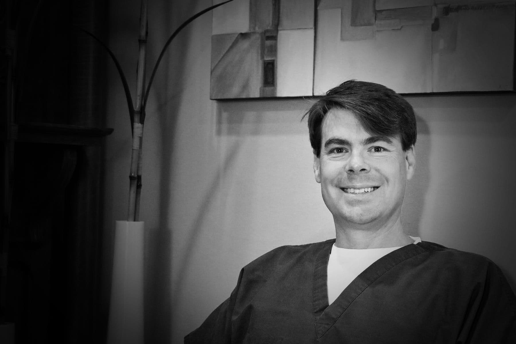 A portrait of Dr. J. Eric Herrington, a Meridian Periodontist